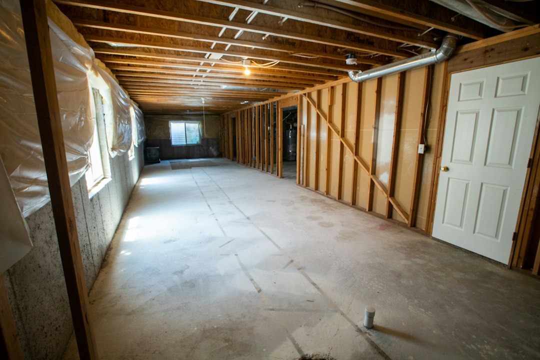 Unfinished house basement prone to water damage, illustrating home insurance exclusions in Quebec